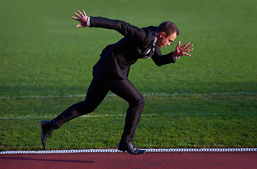 Image showing business man ready to sprint