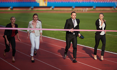 Image showing business people running on racing track