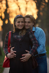 Image showing young pregnant couple have fun and relax