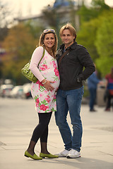 Image showing young pregnant couple have fun and relax