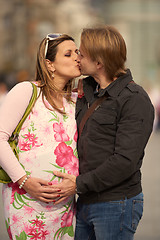 Image showing young pregnant couple have fun and relax