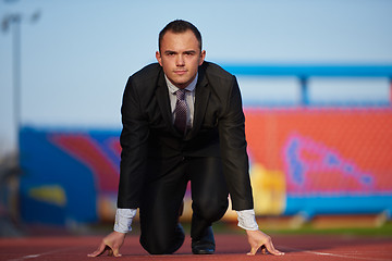 Image showing business man ready to sprint