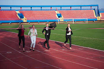 Image showing business people running on racing track