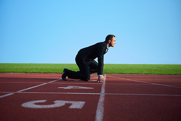 Image showing business man ready to sprint