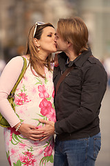 Image showing young pregnant couple have fun and relax