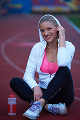 Image showing sporty woman on athletic race track