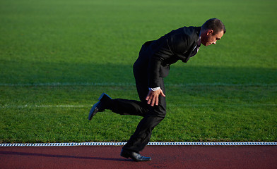 Image showing business man ready to sprint