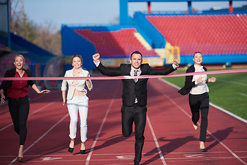 Image showing business people running on racing track