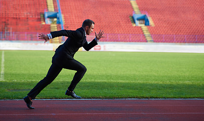 Image showing business man ready to sprint