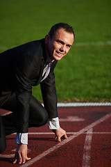 Image showing business man ready to sprint