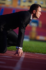 Image showing business man ready to sprint