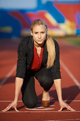 Image showing business woman ready to sprint