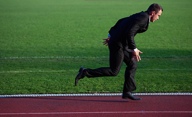 Image showing business man ready to sprint