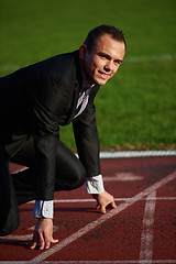 Image showing business man ready to sprint