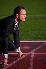 Image showing business man ready to sprint