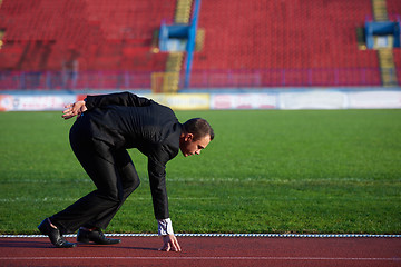 Image showing business man ready to sprint