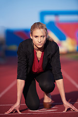 Image showing business woman ready to sprint