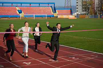 Image showing business people running on racing track