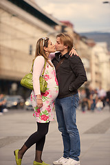 Image showing young pregnant couple have fun and relax