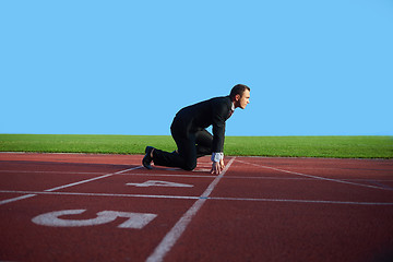 Image showing business man ready to sprint