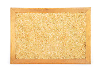 Image showing Brown cane sugar in frame