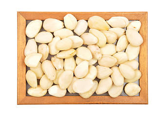 Image showing Blanched almonds at plate