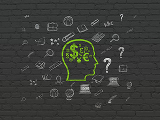 Image showing Learning concept: Head With Finance Symbol on wall background