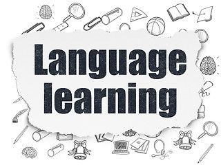 Image showing Learning concept: Language Learning on Torn Paper background