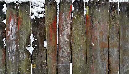 Image showing Old wooden fence in winter