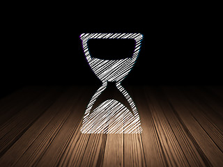 Image showing Timeline concept: Hourglass in grunge dark room
