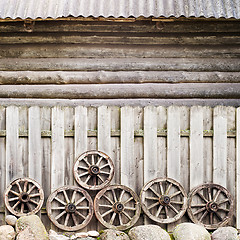 Image showing wodden fence near the wall