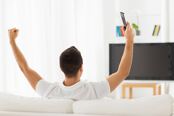 Image showing man watching tv and supporting team at home