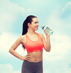 Image showing sporty woman with water bottle