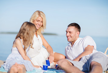 Image showing happy family having a picnic