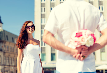 Image showing smiling couple in city