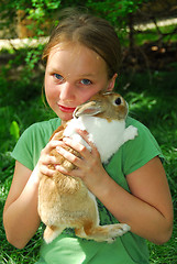 Image showing Gril with bunny