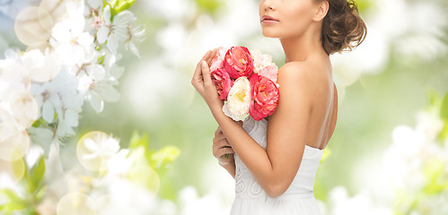 Image showing bride or woman with bouquet of flowers