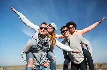 Image showing happy friends in shades having fun outdoors