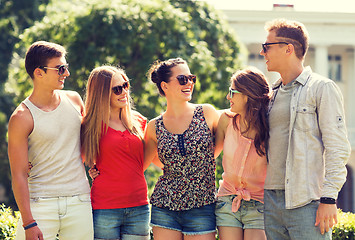 Image showing group of smiling friends outdoors