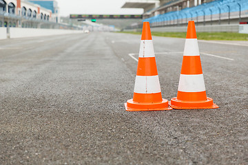 Image showing traffic cones on speedway of stadium