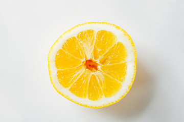 Image showing ripe orange or lemon slice over white