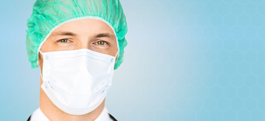 Image showing male surgeon face in medical cap and mask