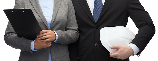 Image showing businesspeople with clipboard and helmet