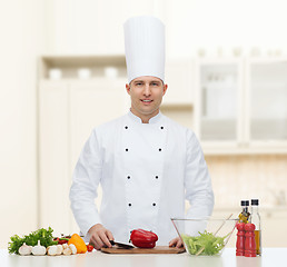 Image showing happy male chef cook cooking food