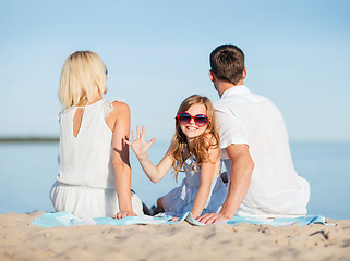 Image showing happy family on the beach