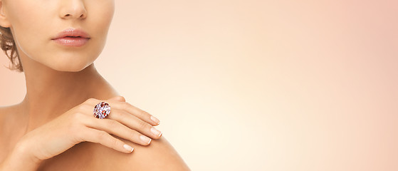 Image showing close up of woman with cocktail ring on hand