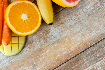 Image showing close up of fresh juicy fruits on table