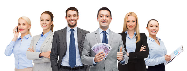 Image showing smiling businessman with american dollar money