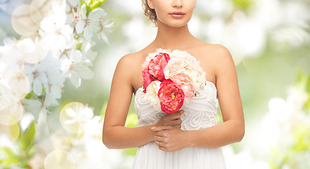 Image showing bride or woman with bouquet of flowers