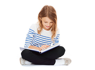 Image showing girl reading book